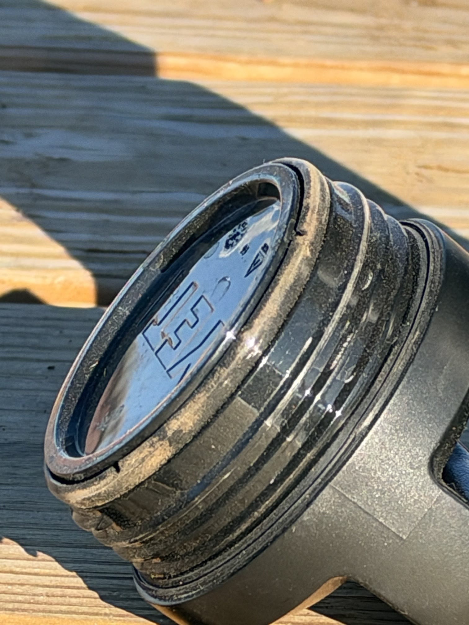 Case 01 cap threads and gasket with visible grime, photographed as-is